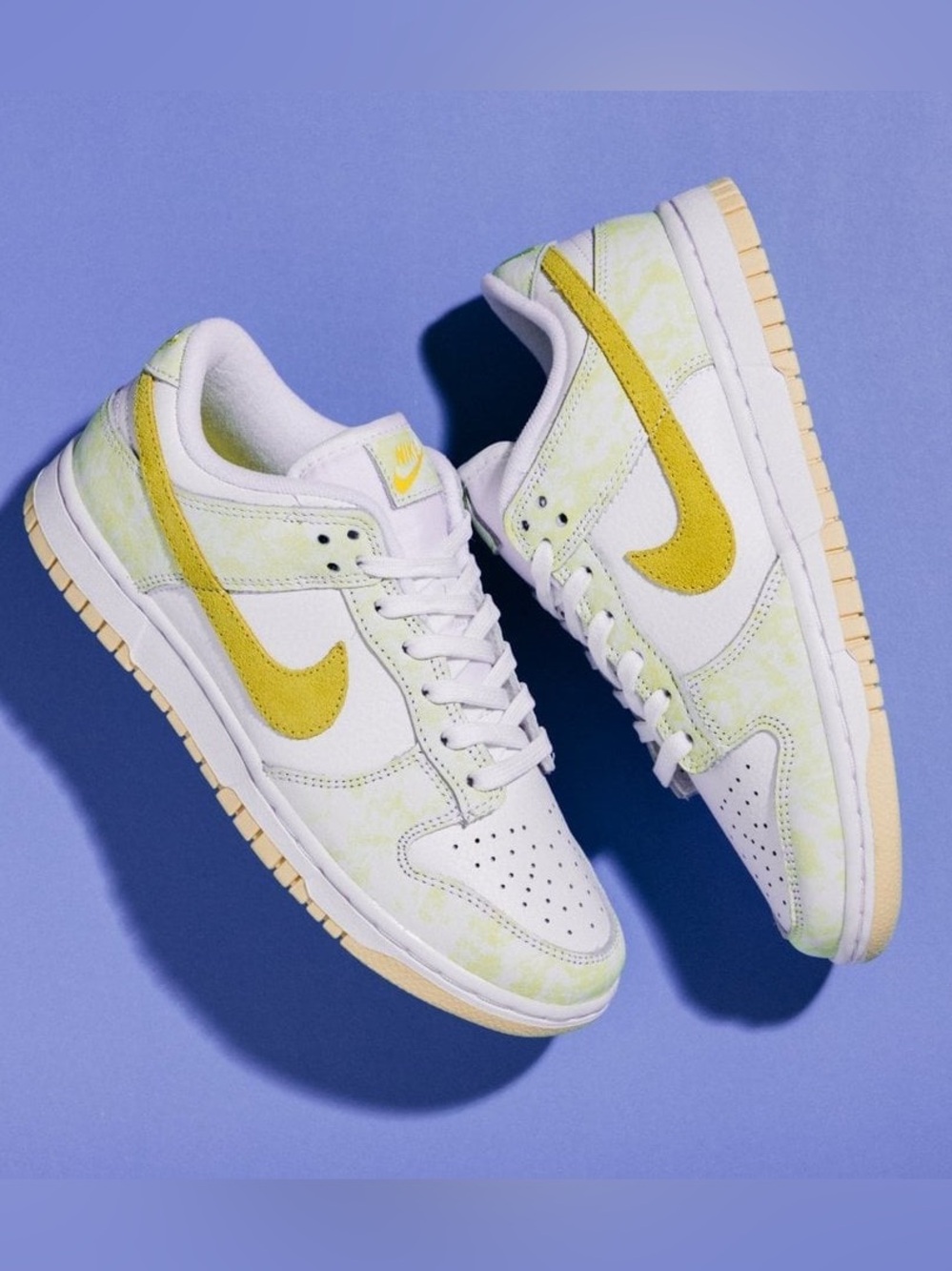 Nike Womenโs Low-Top Sneakers in Yellow and White with Pale Green Accents